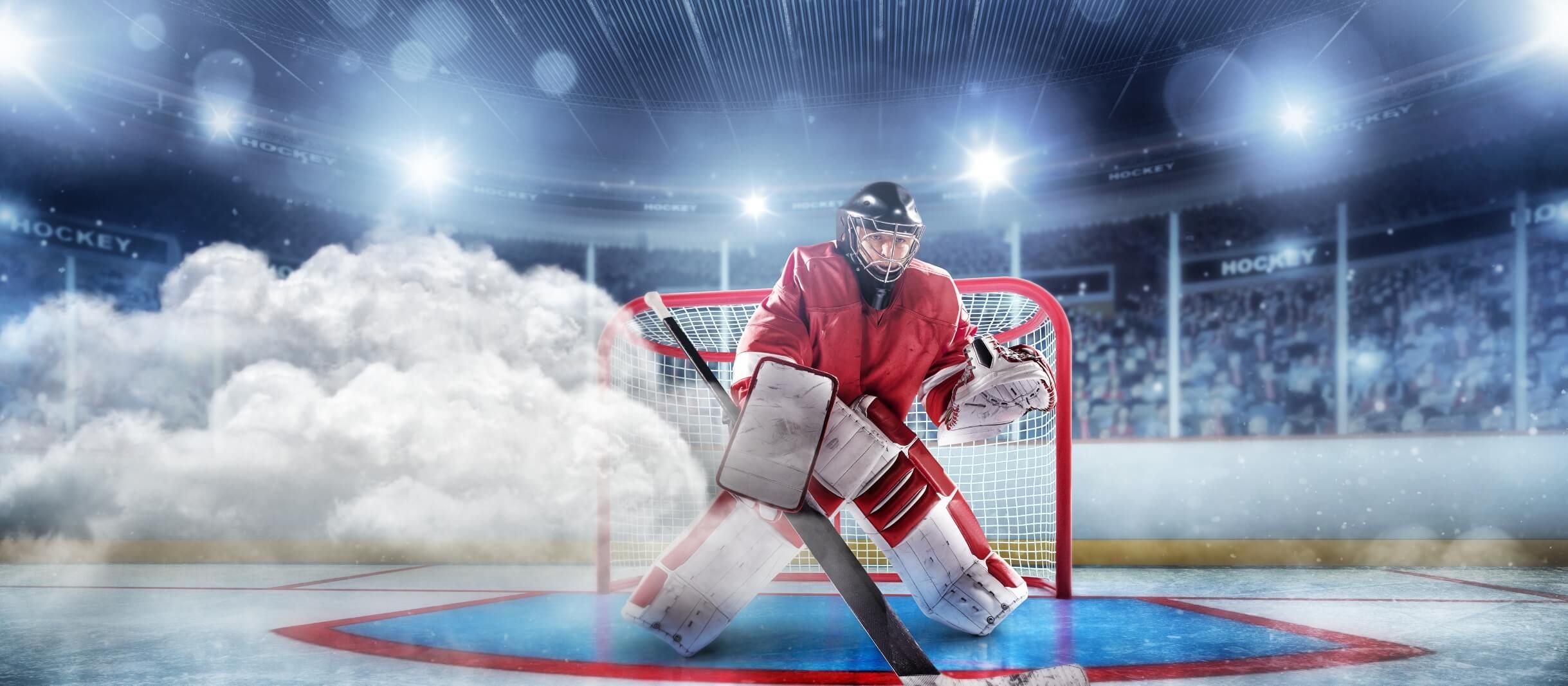 Hockey goaltender in goal with clouds to the left on the rink VI Storm Athletics
