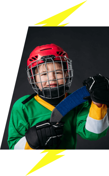 Kids hockey player posing for the camera black background with lightning bolt image accents Spring Hockey Program VI Storm Athletics