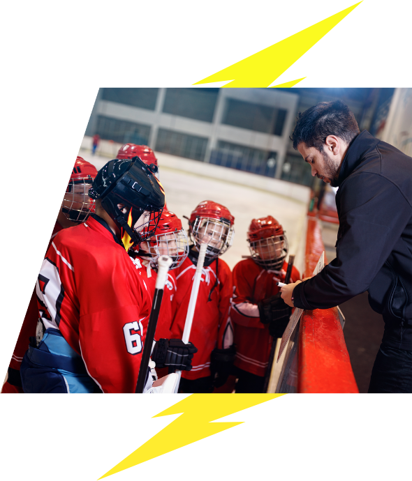 VI Storm Athletics coach talking to young hockey players on the ice lightning bolt image accents