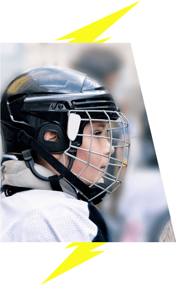 Kids hockey player with lightning bolt image accent VI Storm Athletics