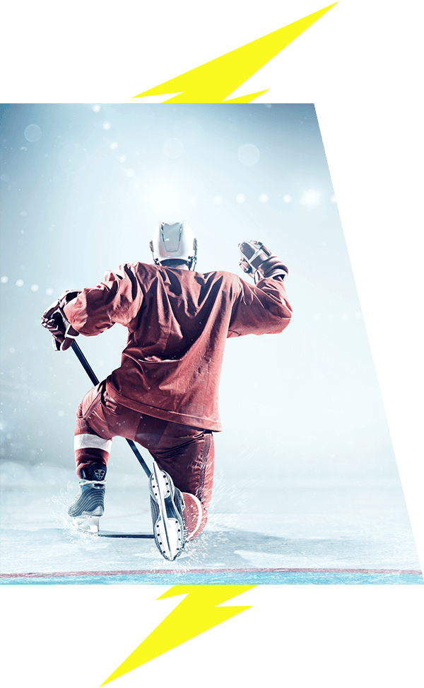 Hockey player on the ice celebrating goal lightning bolt image accents VI Storm Athletics
